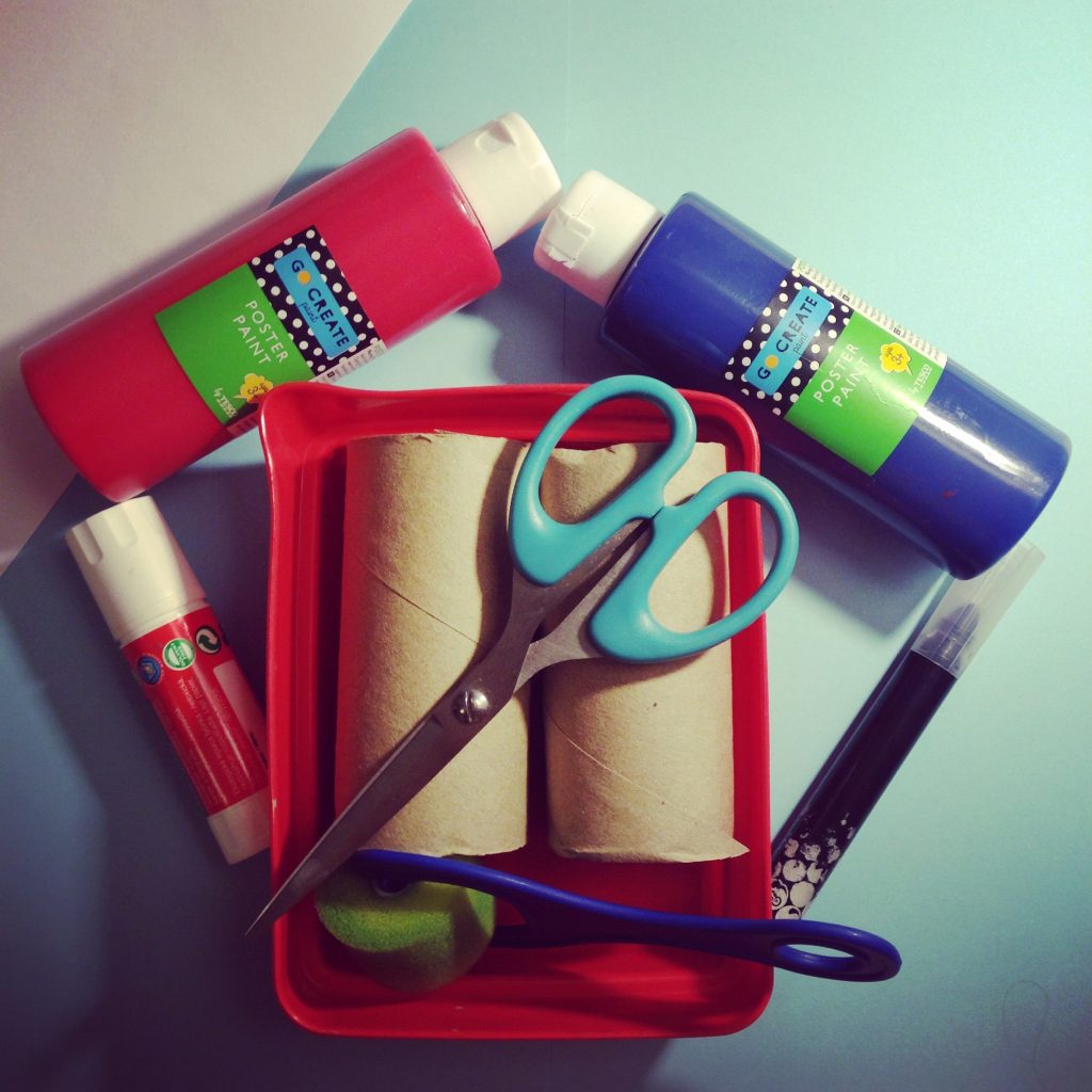 You will need scissors, paint and paintbrushes, toilet paper tubes, glue, white paper and a marker pen.